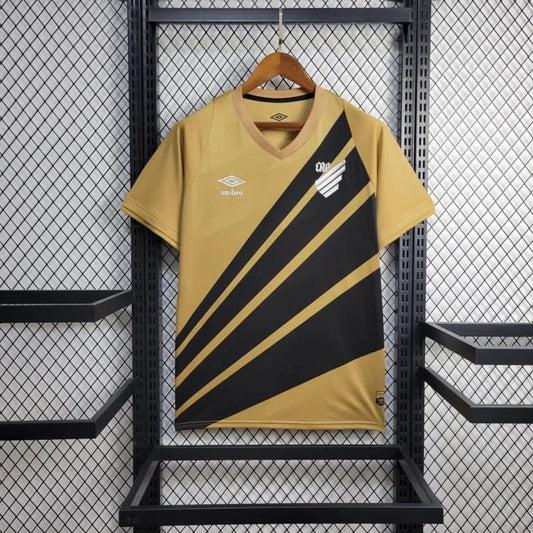 Camisa Athletico Paranaense Away 24-25 – Edição Centenário Dourada com Detalhes Pretos